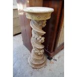 An old weathered composition stone garden pedestal, indistinctly stamped, 87cm high, (s.d.).