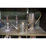 A small group of silver plate, comprising: a George III oval bachelors teapot; a pair of