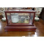 A mahogany barograph, by Casella, with chart drawer, 37.5cm wide.