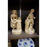 A pair of Robinson and Leadbeater vellum ware figures, 27cm high.