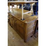 An Ercol 'Golden Dawn' sideboard, 122.5cm wide.