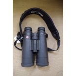 A pair of Leica 'Ultravid' 12 x 50 HD binoculars, No.1977734, with instruction book and Leica lens