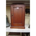 A small antique oak cabinet, 41.5cm high.