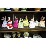 Nine Royal Doulton figures, comprising: 'June', HN2991; 'Winter', HN5314; 'Happy Birthday 2005',