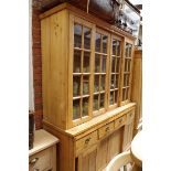 An old pine kitchen cabinet, with two pairs of sliding glass panel doors, 173cm wide.