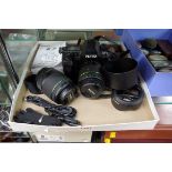 A Pentax K-5 digital camera, with 1:3.5-5.6, 18-55mm AL WR lens; and 1:4-5.6, 50-200mm ED WR lens;