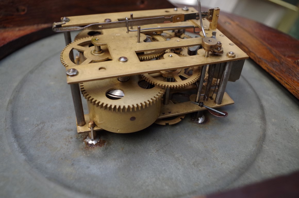 An oak circular wall clock, with 12in painted dial, with pendulum and winding key. - Image 4 of 6