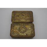 Two Christmas 1914 brass tins.