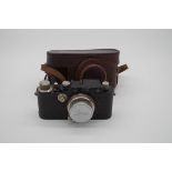 A Leica III black camera, No.145408, with Summar 1=5cm, 1:2 lens, No.199849, with Leica dustcap,