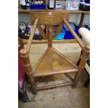 A pair of carved oak Turner's chairs.