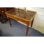 A good 19th century figured walnut writing table, in the manner of Gillows, with brass three quarter