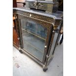 A late 19th century ebonized and parcel gilt pier cabinet, 85cm wide.