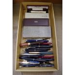 An interesting collection of vintage fountain pens and similar, to include: eleven with 14k nibs,