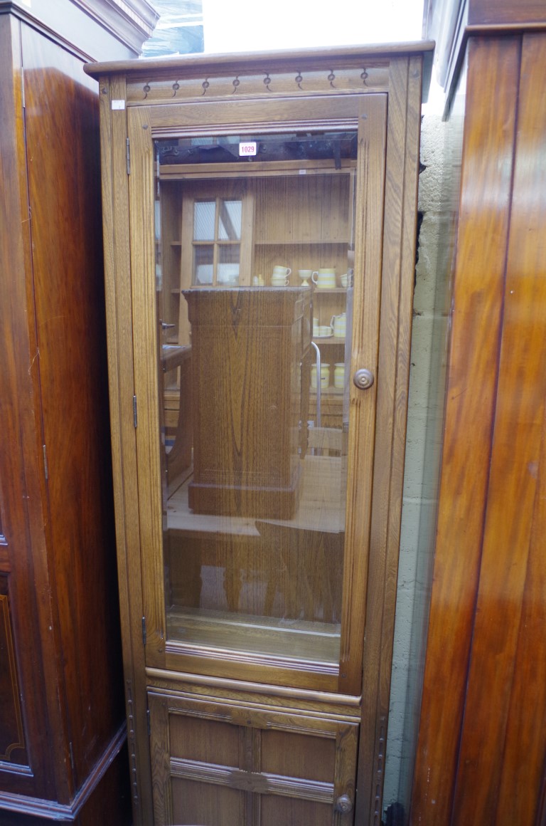 An Ercol 'Golden Dawn' bookcase, 64.5cm wide.