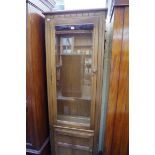 An Ercol 'Golden Dawn' bookcase, 64.5cm wide.