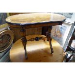 A late 19th century Continental walnut and ebonized centre table, 99cm wide.