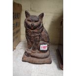 An old cast iron cat doorstop, 20cm high.