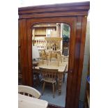 A Victorian mahogany mirror door single wardrobe, 132cm wide.