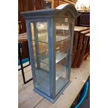 A small blue painted display cabinet, 69.5cm high.