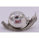 A silver novelty snail tape dispenser, by Garrard & Co Ltd, London 1996, 13.5cm long.