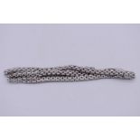 An unusual Italian .750 white gold necklace extender, 40cm, 30g.