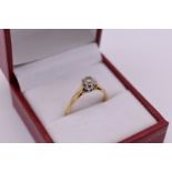 A solitaire diamond gold ring, hallmarked 750, approx 0.5ct, 2.5g total weight.