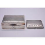 An engine turned silver cigarette case, by W T Toghill & Co, Birmingham 1948, 9.5cm, 140g gross;