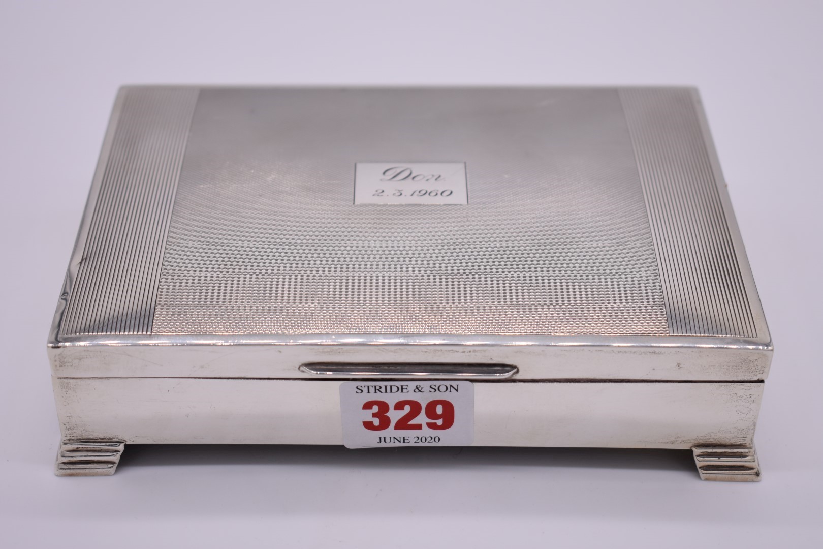 A silver cigarette box, by Viners, Sheffield 1958, having engine turned decoration, 17cm.