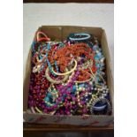 Three coral necklaces and a quantity of costume jewellery.