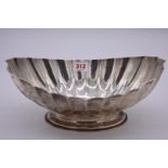 A silver fluted oval pedestal bowl, by Hukin & Heath, London 1901, 30.5cm, 634g.