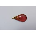 A yellow metal jade, amethyst, citrine and garnet pear shaped pendant, 4.1cm, 16.3g gross.