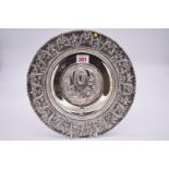 A Greek white metal dish, 'Sterling 925', decorated Mary and infant Christ, stamped, 27cm.