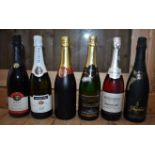 Sixteen various bottles of sparkling wine. (16)