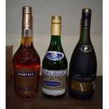 Three bottles of brandy, comprising: Martel VS; Remy Martin VSOP; and Burnez Freres. (3)