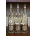 Three 24 1/2 fl.oz. bottles of Cusenier Mirabelle Eau-de Vie. (3)