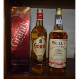 Two bottle of blended whisky, comprising: a 1 litre Bell's; and a 70cl Grant's, in card box. (2)