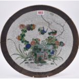 A Chinese famille verte crackle glazed charger, late 19th century, 37.5cm diameter.