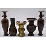 A small group of Chinese and Japanese bronze vases, largest 23cm high. (5)