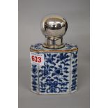 A Chinese blue and white tea canister and white metal cover, the canister 18th century, painted with