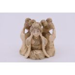 A Japanese carved ivory figure group of three geishas, Meiji, depicting 'see no evil, hear no