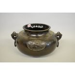 WITHDRAWN FROM SALE A large Chinese bronze twin handled tripod vessel.