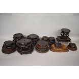 WITHDRAWN FROM SALE An interesting collection of Chinese hardwood stands. (20)