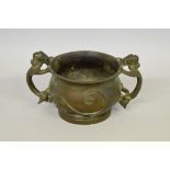 WITHDRAWN FROM SALE A Chinese Archaistic bronze twin handled censer.