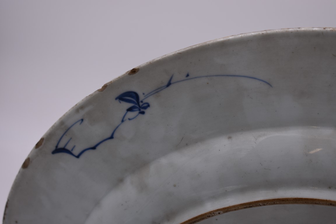 A Chinese blue and white charger, 18th century, painted with flowering branches, 37.5cm diameter, ( - Image 6 of 8