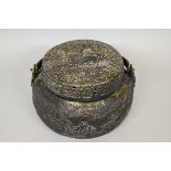 A Chinese bronze swing handled vessel and pierced cover, possibly a hand warmer, xuande four