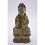 A Chinese carved soapstone figure of Guanyin, of mottled celadon colour, 26.5cm high.