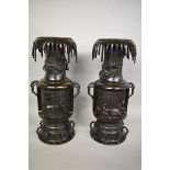 WITHDRAWN FROM SALE A large and impressive pair of Japanese bronze twin handled vases.