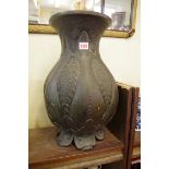 A large Chinese Archaistic bronze vase, relief mark to base, of moulded form with stylized