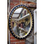 An Irish style oval wall mirror, 80cm high.