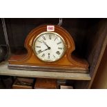An Edwardian inlaid mahogany striking mantel clock, 45.5cm wide, with pendulum and key, (s.d.).